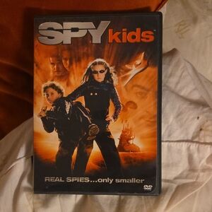 Lauren Ralph Lauren Spy Kids DVD - Black and Orange Cover